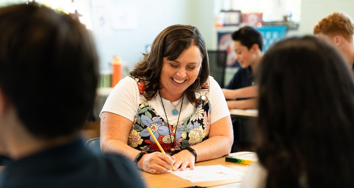 Teacher Smiling in Class